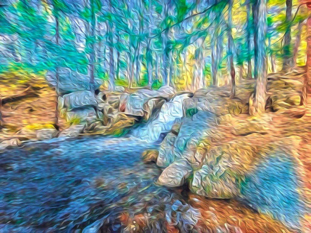 The photograph captures the tranquil beauty of the falls at Peters Brook in Blue Hill, Maine. Part of the Blue Hill Heritage Trust, this serene spot is renowned for its cascading waters and lush, surrounding forest. The image is rendered with painterly effects, adding a timeless, artistic quality that enhances the natural splendor of the scene.