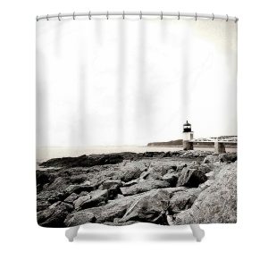 This photograph. Taken on 07/17/2024, captures the Marshall Point Lighthouse, famously known as the "Forrest Gump Lighthouse" due to its appearance in the movie "Forrest Gump." Located in Port Clyde, Maine, the lighthouse stands at the end of a picturesque white wooden walkway extending over rugged coastal rocks. The image is rendered with a vintage, artistic effect, enhancing the lighthouse's historical charm and the dramatic coastal landscape. The soft pastel sky adds a serene, timeless quality to the scene, making it a captivating subject for photography enthusiasts and admirers of maritime history. Capture the timeless beauty of coastal Maine with our Marshall Point Shower Curtain. This stunning photograph by Blaine Stoner features the iconic Marshall Point Lighthouse, standing resilient on the rocky shores, guiding sailors through the fog and mist. The black-and-white tones add a classic touch, making this shower curtain a perfect addition to any bathroom seeking a nautical or historical theme. Key Features: High-quality fabric: Made from 100% polyester, this shower curtain is durable, water-resistant, and designed to last. Crisp, fade-resistant print: The detailed photography is printed with precision, ensuring that the natural textures and contrasts remain vibrant over time. Generous size: Measuring 71" x 74", it provides full coverage for standard showers and bathtubs. Easy installation: Comes with 12 reinforced hook holes, making it simple to hang with your favorite shower curtain hooks. Machine washable: Easy to care for, this shower curtain is machine washable, allowing for hassle-free maintenance. Perfect for any bathroom: Home decor: Add a touch of maritime history and coastal charm to your bathroom with this unique and artistic shower curtain. Gifting: This shower curtain makes a thoughtful gift for those who appreciate lighthouses, photography, and nautical decor. Transform your bathroom into a coastal retreat with the Marshall Point Shower Curtain. Photography by Blaine Stoner.