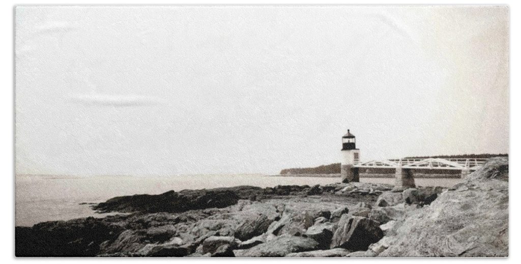 Elevate your bathroom decor with the "Olde Time Lighthouse" towel, featuring the nostalgic black-and-white photography of Blaine Stoner. This towel beautifully captures the vintage charm of a timeless lighthouse, adding a touch of coastal elegance to your home. Perfect for history enthusiasts, coastal lovers, or anyone who appreciates a blend of rustic and nautical themes. Key Features: Premium Quality Fabric: Crafted from 100% polyester, ensuring a soft, absorbent, and durable towel for everyday use. Detailed, Fade-Resistant Print: The high-resolution image preserves the intricate details and vintage appeal of the lighthouse, offering a piece of art that withstands time and multiple washes. Versatile Size Options: Available in various sizes, from hand towels to full beach towels, catering to your needs. Easy Care: Machine washable, making it easy to maintain its quality and keep the towel looking fresh. Perfect for Any Bathroom: Home Decor: Add a touch of coastal nostalgia to your bathroom with this unique towel. Gifting: A thoughtful gift for lighthouse lovers, coastal decor enthusiasts, or fans of Blaine Stoner's photography. Bring the serene beauty of a classic lighthouse into your bathroom with this timeless towel. Photography by Blaine Stoner.