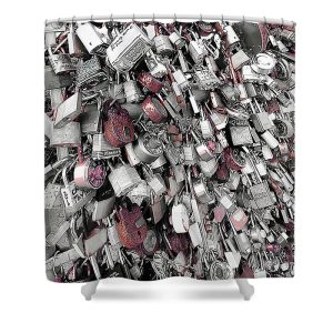 Add a touch of urban romance to your bathroom with the "Love Locks of Red" shower curtain, featuring the striking photography of Blaine Stoner. This curtain showcases an array of padlocks, a symbol of love and commitment, artistically highlighted in red amidst a sea of grayscale, creating a captivating contrast. Perfect for those who want to bring a unique and meaningful piece of art into their home, this shower curtain is not just functional but also a conversation starter. Key Features: Premium Quality Fabric: Crafted from high-quality materials for durability and a luxurious feel. Vivid, Fade-Resistant Print: The colors are expertly printed to maintain their brilliance over time, ensuring your shower curtain remains a stunning piece of art. Easy Installation: Comes with reinforced holes and hooks for easy setup in your bathroom. Easy Care: Machine washable for hassle-free cleaning and maintenance. Bring a piece of romantic urban landscape into your home with this stunning shower curtain. Photography by Blaine Stoner.