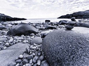 After The Storm Puzzle by Blaine Stoner featuring a serene landscape after a storm with a calm sky in shades of grey and blue