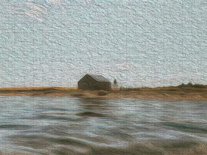 Painterly photograph of a boat house reflected in calm waters, with a soft shoreline and sky, captured by Blaine Stoner.