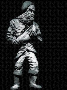 The Fishmonger Puzzle by Blaine Stoner featuring a black-and-white image of a fishmonger statue holding a fish.