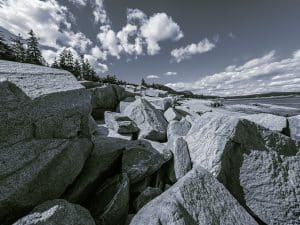 Massive granite boulders between Otter Cliffs and Thunder Hole rise from Acadia’s rugged shoreline. A moment of stillness along the Ocean Path Trail.